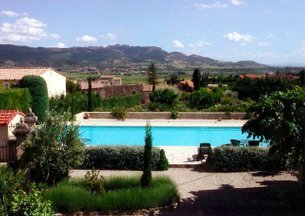 View from House over swimming pool, garden and Dentelles des Montmirail